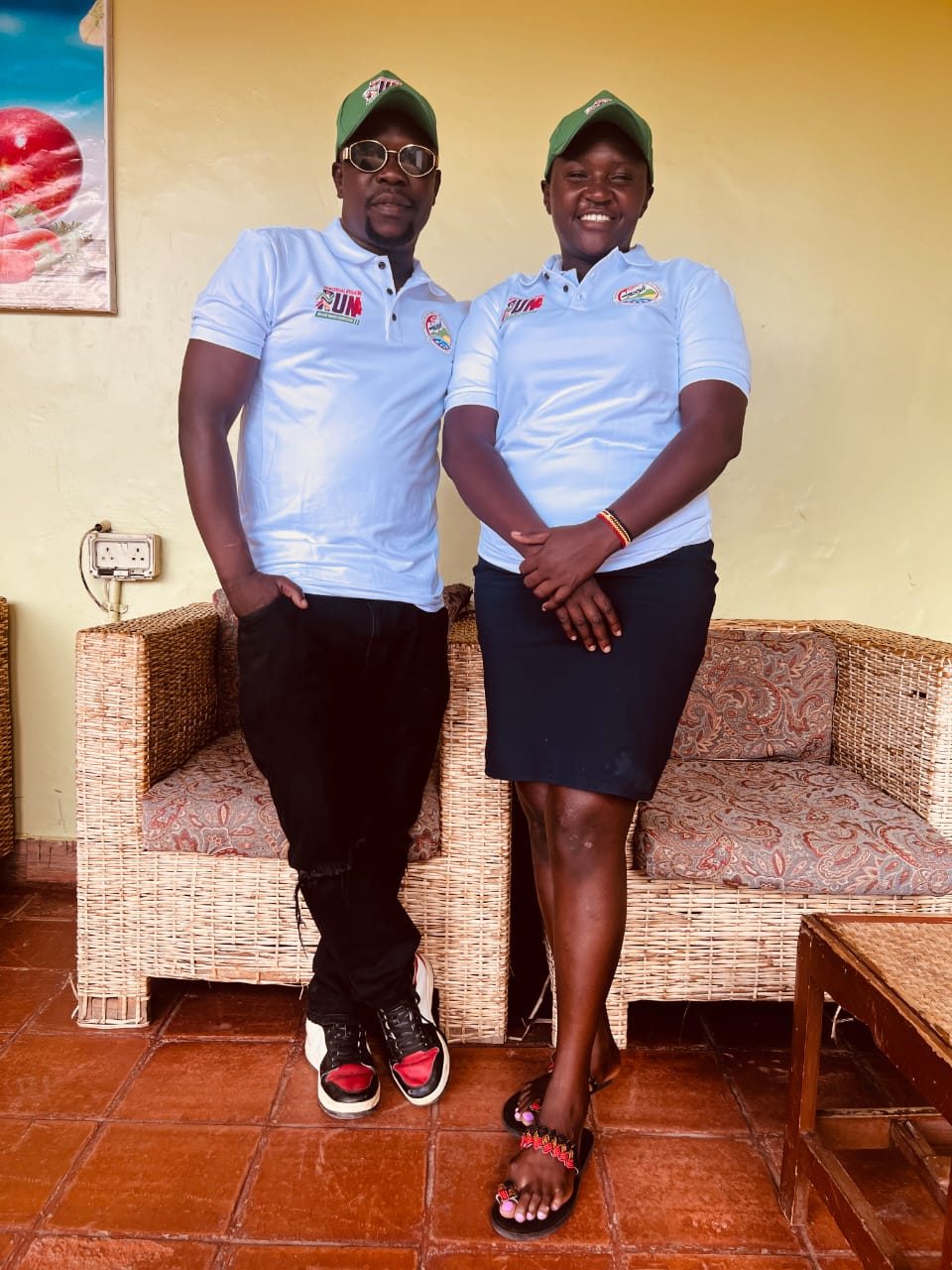 Two people wearing menstrual hygiene run shirts